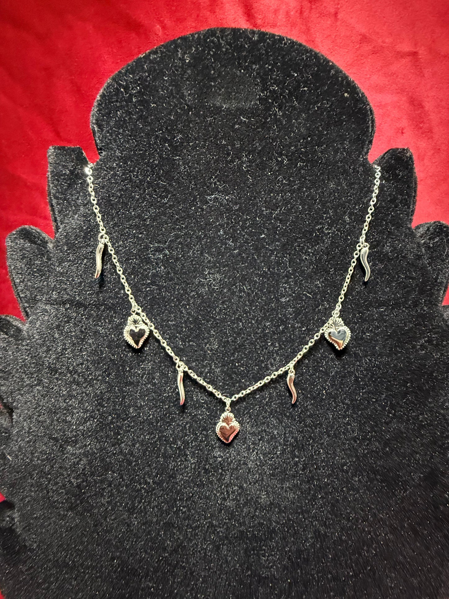collana-cuore-santo-e-corno