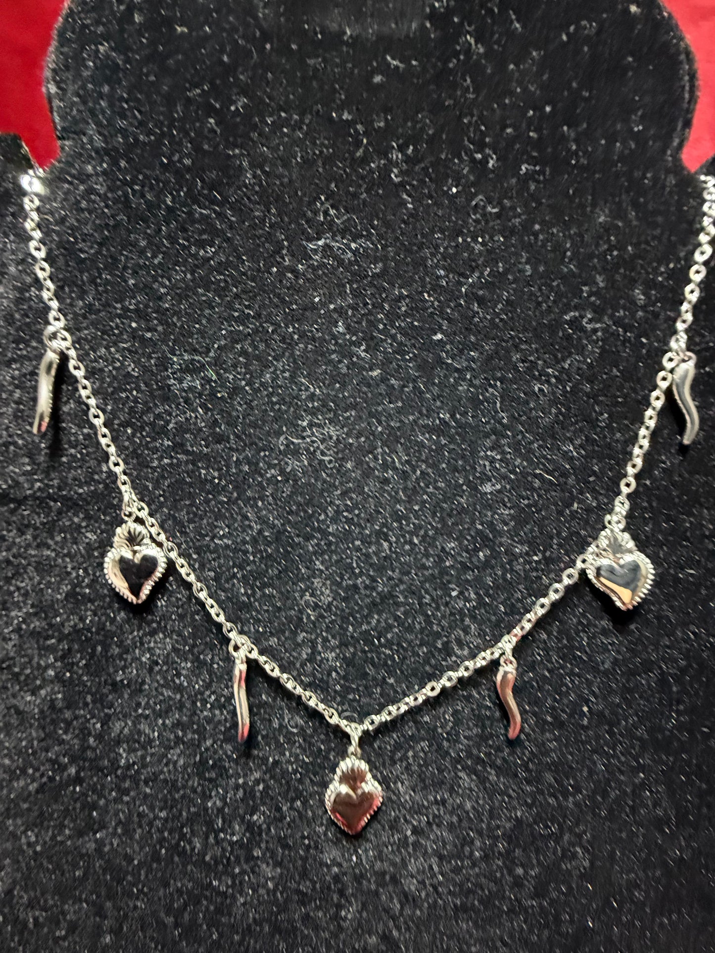 collana-cuore-santo-e-corno