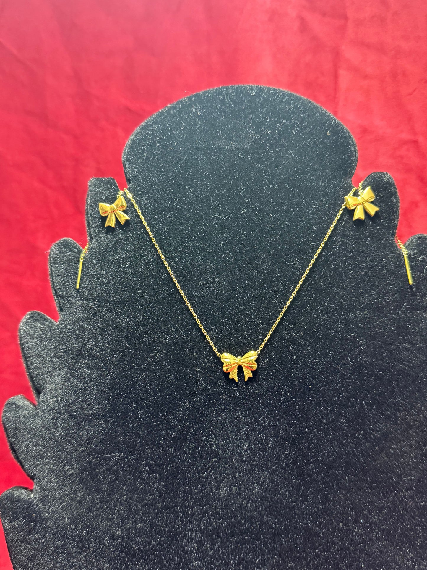 coppia-collana-orecchini-fiocco