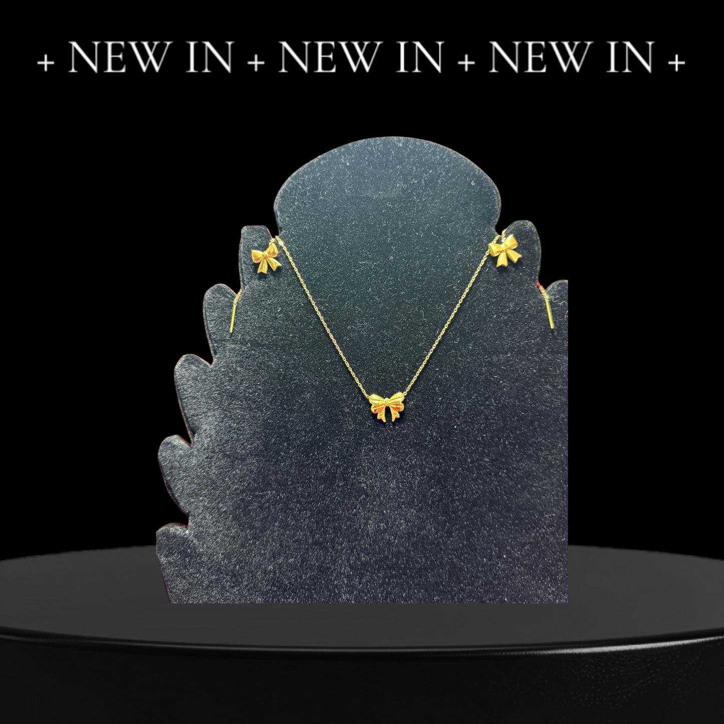 coppia-collana-orecchini-fiocco