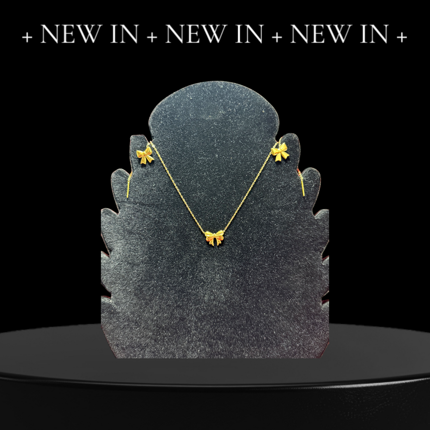 coppia-collana-orecchini-fiocco