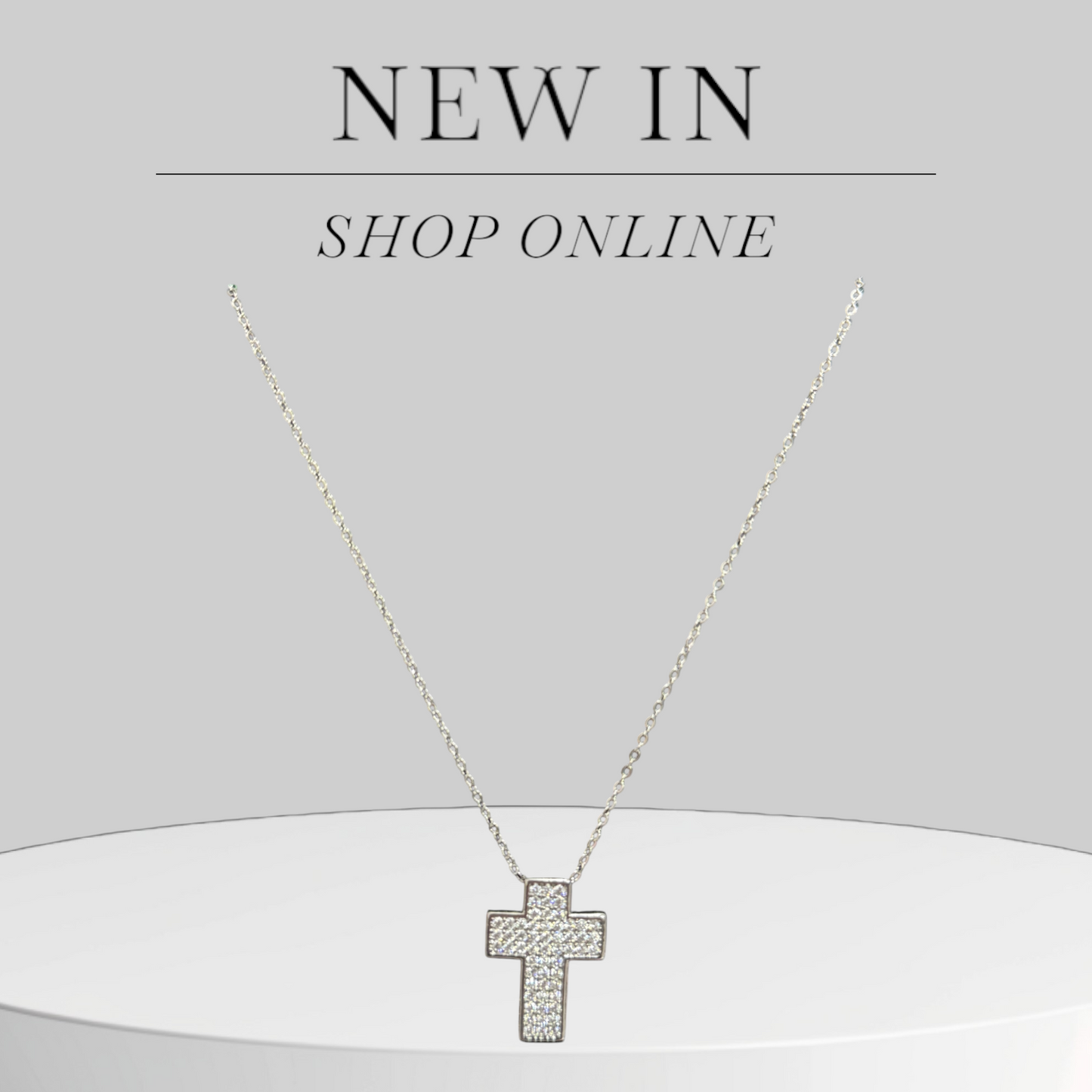 collana-croce-con-brillantini-oro-argento