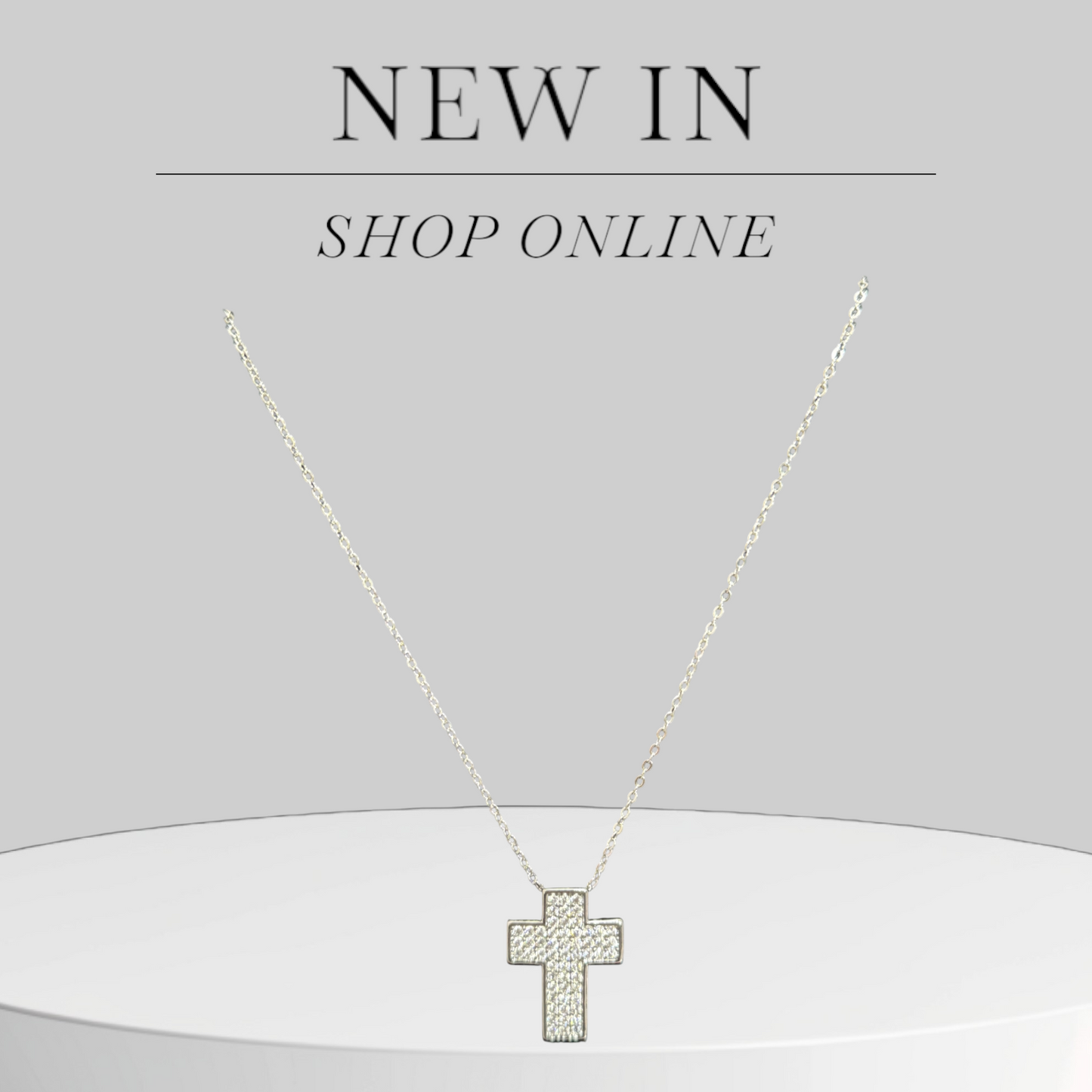 collana-croce-con-brillantini-oro-argento